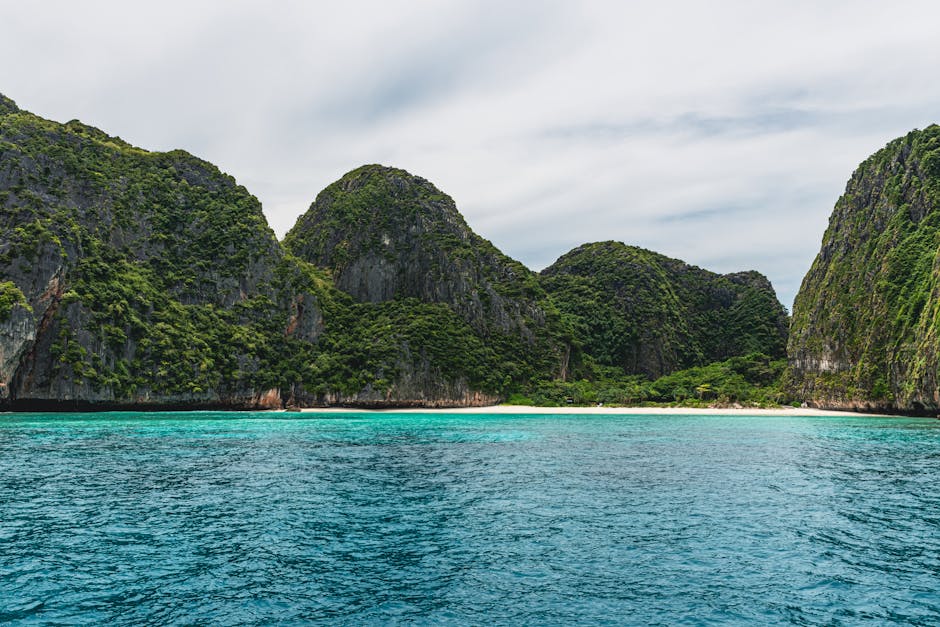 Beautiful turquoise waters and limestone cliffs in Phuket, Thailand.