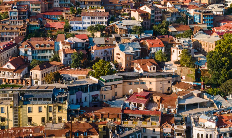 Vibrant aerial view showcasing the diverse architecture of Tbilisi, Georgia.