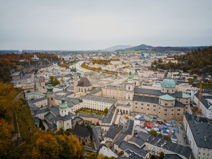 Explore the stunning architectural beauty and historic charm of Salzburg from above.